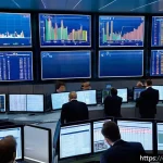 Home 21 외환 정책 변화 사례 - A sophisticated modern European trading floor scene at dusk, featuring diverse professional traders ...